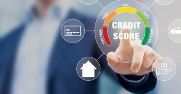 man-is-pointing-credit-score-screen-with-button-that-says-credit-score_920245-34